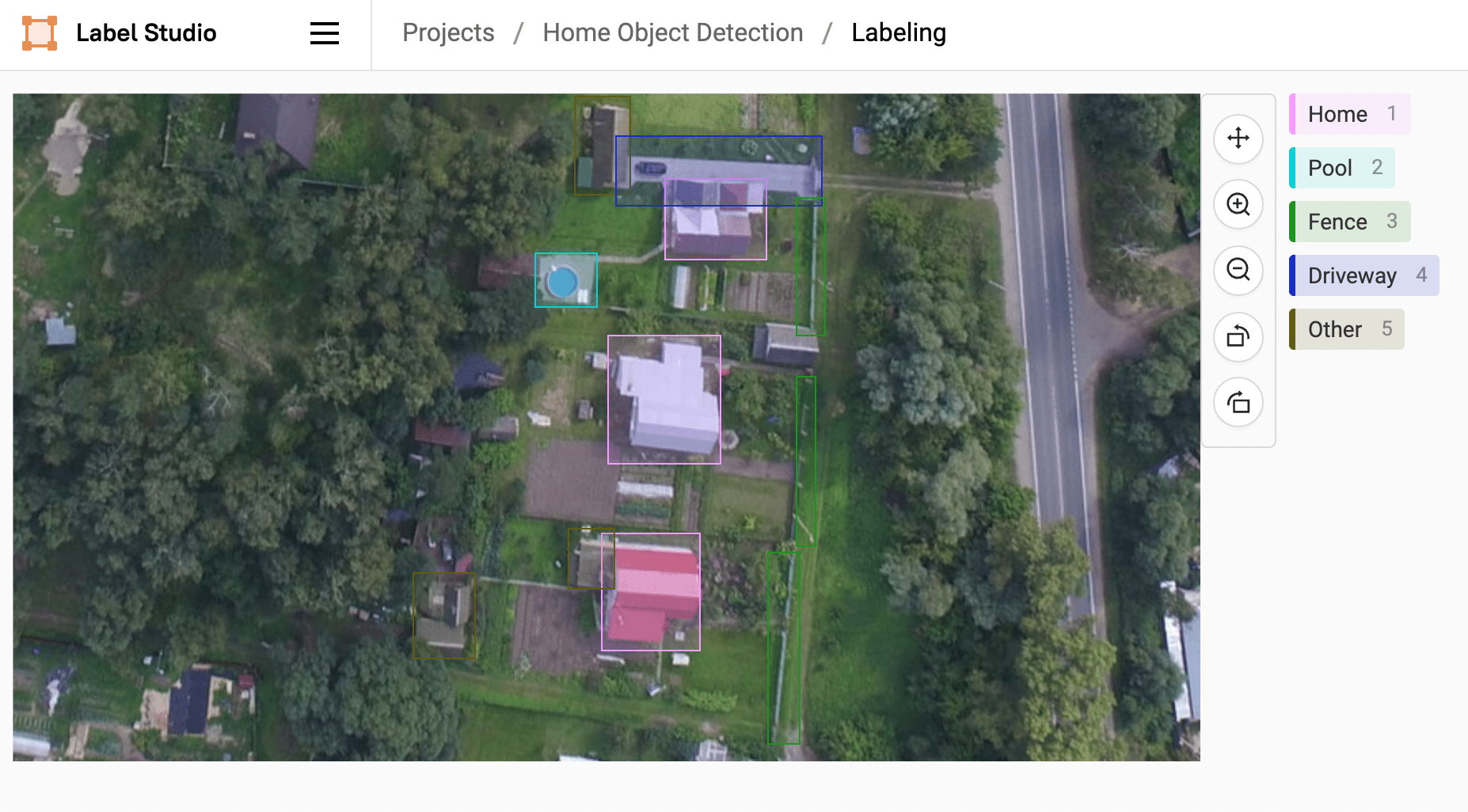 Screenshot of labeled aerial homes with bounding boxes for pools, homes, driveways, and fences in the Label Studio UI.