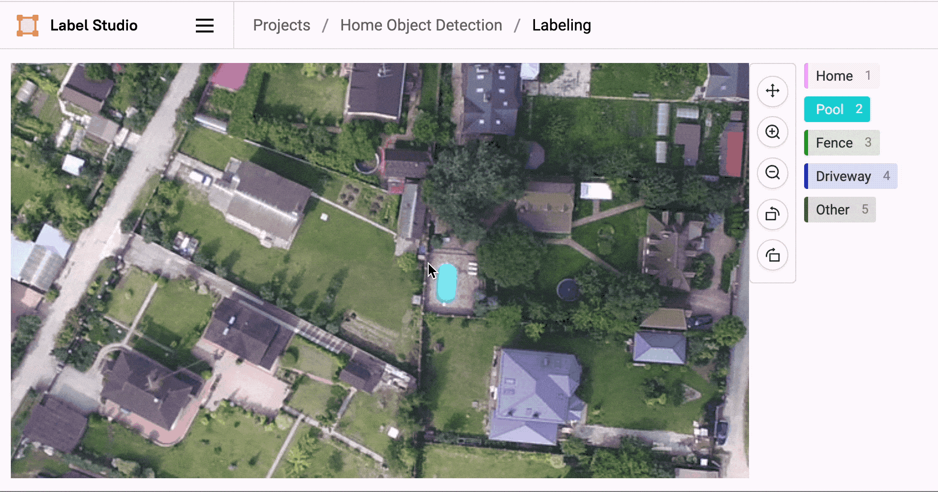 Gif of quickly labeling an aerial image with bounding boxes for pools, homes, driveways, and fences in the Label Studio UI.